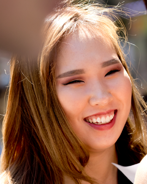 an International student smiling