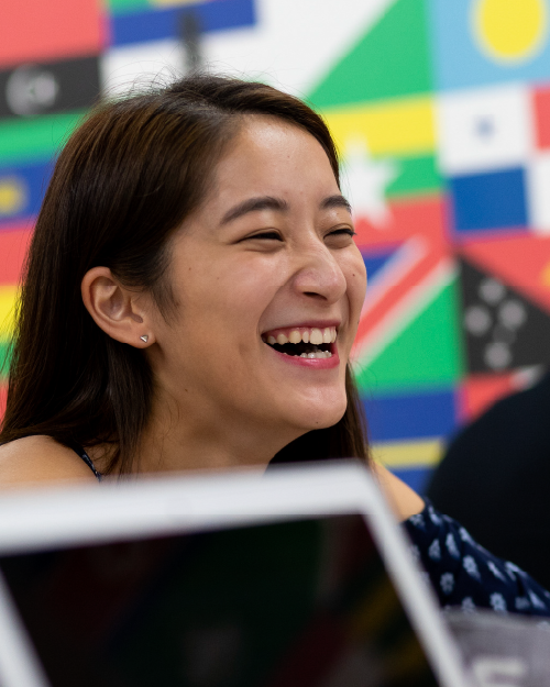 an International student smiling