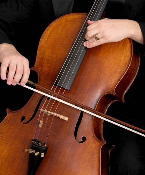 Two hands are shown playing the Cello. The right hand is shown holding the bow and the other is shown holding musical chord on the neck of the cello. Temple Music Prep provides high quality, non-credit music, and dance instruction, and related activities to the Philadelphia Community on behalf of the Boyer College of Music and Dance, and Temple University, at-large.