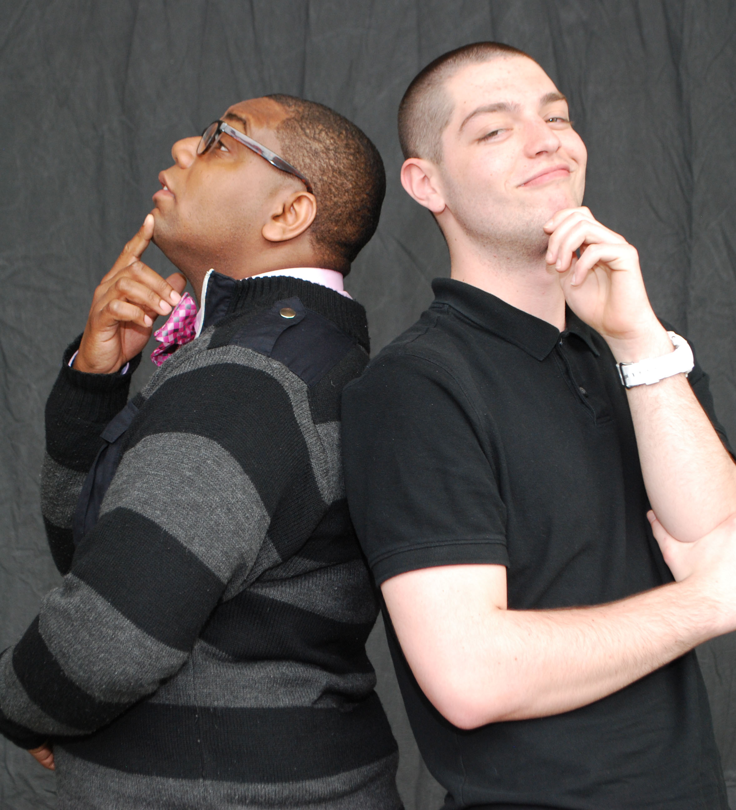 Two Students Posing Back to Back
